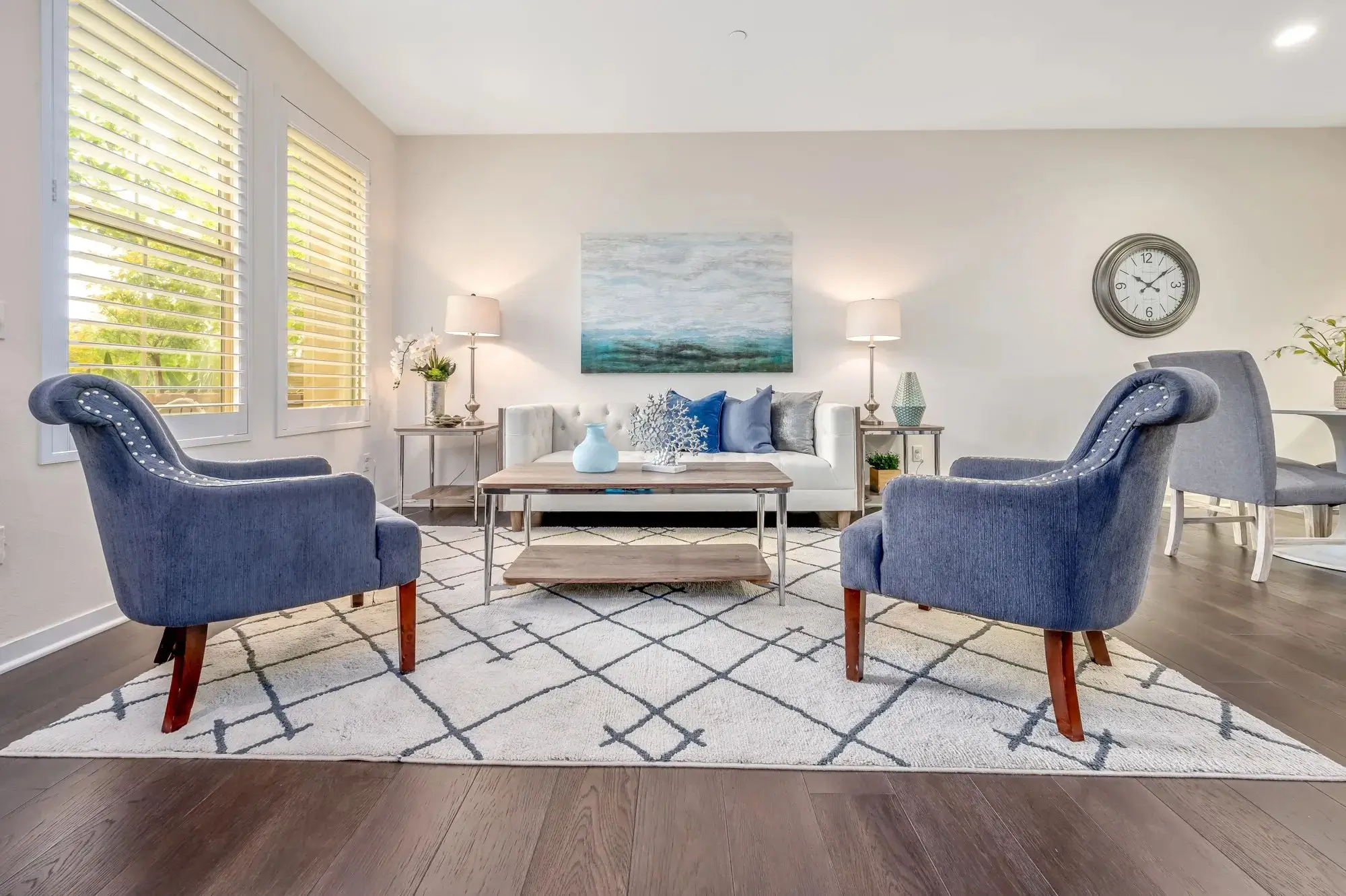 Staged living room with soft blue accents